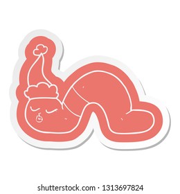 quirky cartoon  sticker of a worm wearing santa hat