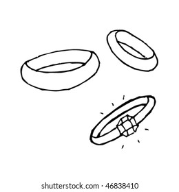 quirky ink drawing of engagement and wedding rings