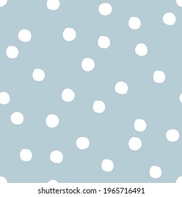 Quirky round shapes vector seamless pattern. Winter snow confetti neutral blue design. Hand drawn geometric abstract polka dots childish background