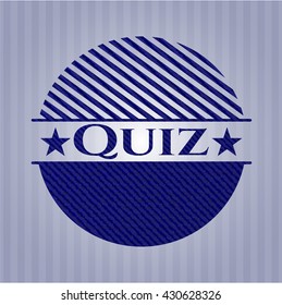 Quiz emblem with jean background