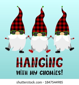 Quote Hanging with my gnomies. Cartoon vector gnomes in green sunglasses and plaid hats. Funny Scandinavian Christmas characters with beards. Holiday card. Isolated on a light blue background.