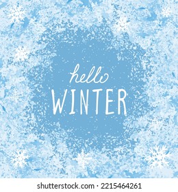 Quote Hello Winter on blue ice background for social media template. Hand drawn vector illustration for winter design with snowflakes.