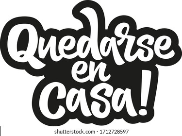 Quote in spanish "Quedarse en casa" (Stay at Home) hand drawn vector lettering. Healthy rules for corona virus pandemic prevention. Social distancing campaign during quarantine COVID-19 pandemic.