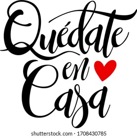 Quote in spanish "quedate en casa" (Stay at Home) black with red heart. isolated on white background. Social distancing campaign during quarentine COVID-19 pandemic