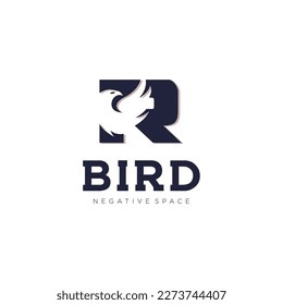 R Initial letter bird logo in simple minimalist negative space