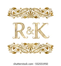 R and K vintage initials logo symbol. The letters are surrounded by ornamental elements. Wedding or business partners monogram in royal style.