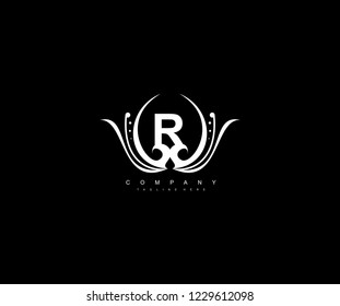R letter linked monogram luxury rounded flourishes ornament logo