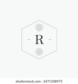 R letter logo with a creative floral concept for company business beauty real estate premium vector