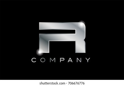R metal metallic silver logo on a black blackground