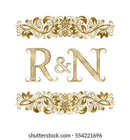 R and N vintage initials logo symbol. The letters are surrounded by ornamental elements. Wedding or business partners monogram in royal style.
