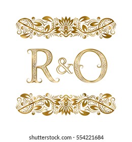 R and O vintage initials logo symbol. The letters are surrounded by ornamental elements. Wedding or business partners monogram in royal style.