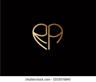 RA initial heart shape gold colored logo