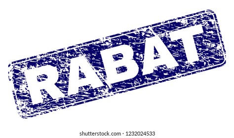 RABAT stamp seal print with grunge style. Seal shape is a rounded rectangle with frame. Blue vector rubber print of RABAT tag with dust style.