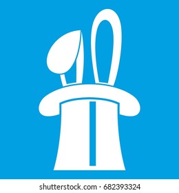 Rabbit appearing from a top magic hat icon white isolated on blue background vector illustration