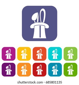Rabbit appearing from a top magic hat icons set vector illustration in flat style in colors red, blue, green, and other