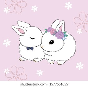 A rabbit with a bow tie on its neck is kissing another rabbit