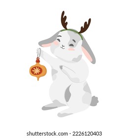 Rabbit with christmas decorations deer antler, bubble. Winter bunny, hare. Happy new year 2023. Chinese New Year of the rabbit. Isolated vector illustration for print, textile, pet icon, kids design