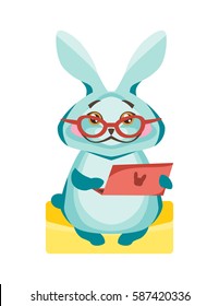 Rabbit with a clever kind face sitting with laptop.