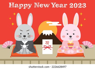 A rabbit couple in a kimono and a New Year's card illustration with a red background, and the New Year's gift bag in the middle says "Congratulations" in Japanese
