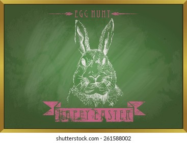 rabbit with doodle chalk happy easter on blackboard