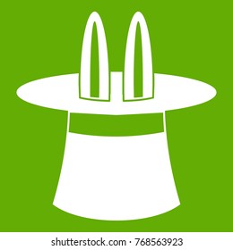 Rabbit ears appearing from a top magic hat icon white isolated on green background. Vector illustration