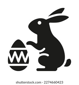 Rabbit and easter egg solid icon. Easter Bunny. Vector Illustration.