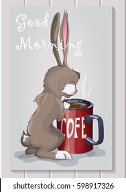 rabbit enjoys the flavor of coffee from a red Cup