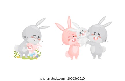 Rabbit Family with Bunny Mom and Dad Embracing Their Cub Vector Set
