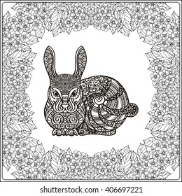 Rabbit in floral frame. Coloring book for adult and older children. Coloring page. Outline drawing. Vector illustration.