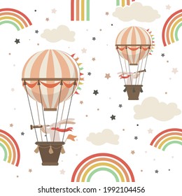 Сute rabbit flying in a hot air balloon. Seamless pattern for nursery textyle or wrapping print