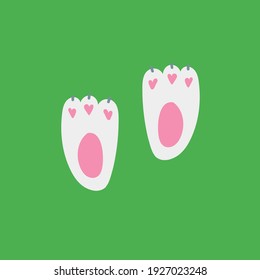 rabbit footprints icon on green background. vector easter bunny foot