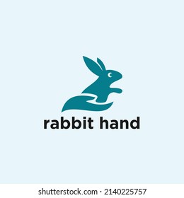rabbit and hand logo design icon vector illustration