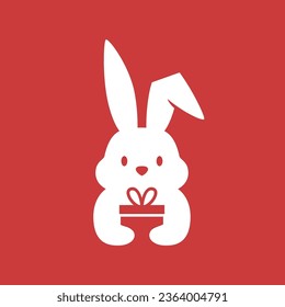 rabbit hare bunny is holding birthday gift Logo Cartoon Mascot character vector icon illustration