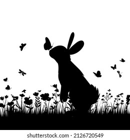 rabbit, hare in the grass with butterflies silhouette on a white background