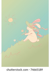 Rabbit in the hat sitting on the grass