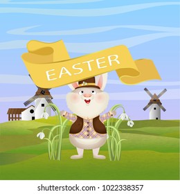 A rabbit in a hat and suit stands and watches as it flies over a yellow ribbon with the inscription Easter. Green field with windmills, sky and clouds. Easter. Vector character and landscape.