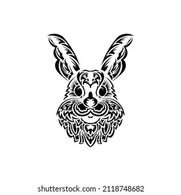 Rabbit head in Polynesian style. Isolated symbol of 2023.