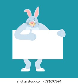Rabbit holding banner blank. Hare and white blank. Animal thumb up and winks joyful emotion. place for text. Vector illustration