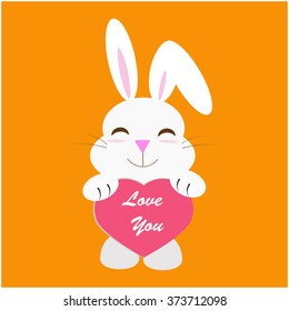 rabbit holding a heart with love you message