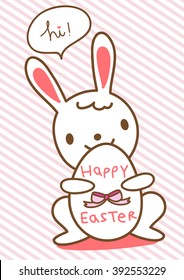Rabbit holds easter egg in pink background