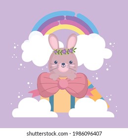 rabbit inside gift box rainbow clouds