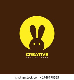 logotipo de conejo, color verde marrón y amarillo. logotipos abstractos, conceptos de diseño, logotipos, elementos de tipo de logotipo para plantillas. Ilustración EPS