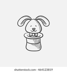 Rabbit in magician hat sketch icon for web, mobile and infographics. Hand drawn vector isolated icon.