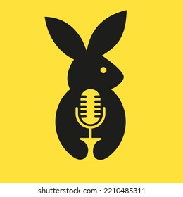 Rabbit Microphone Logo Negative Space Concept Vector Template. Rabbit Holding Microphone Symbol