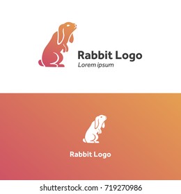 rabbit on hind legs with ears lowered