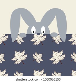 the rabbit, peeking from under the blanket with a pattern of maple leaves