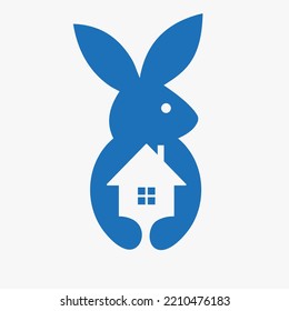 Rabbit Real Estate Logo Negative Space Concept Vector Template. Rabbit Holding Home Symbol