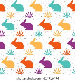 Rabbit seamless pattern background. Abstract purple, yellow, green, orange colored rabbit pattern for card, album, scrapbook, holiday wrapping paper, textile fabric, garment, t-shirt design etc