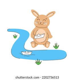 Rabbit sends a paper boat down the stream. Spring character sitting on the ground and holding a paper boat in its paw. Cute beige bunny. Seasonal vector illustration in flat style