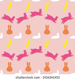 Rabbit Silhouette Laying Down, Jumping, Standing, And Faces. Seamless Pattern. Yellow, Pink, Orange And White Rabbit Vector Illustration On A Light Pink Background.